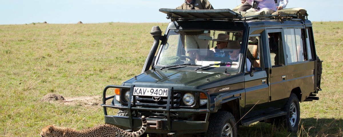 Are Airport Transfers Conducted in Open-Sided or Closed Luxury Safari Vehicles?